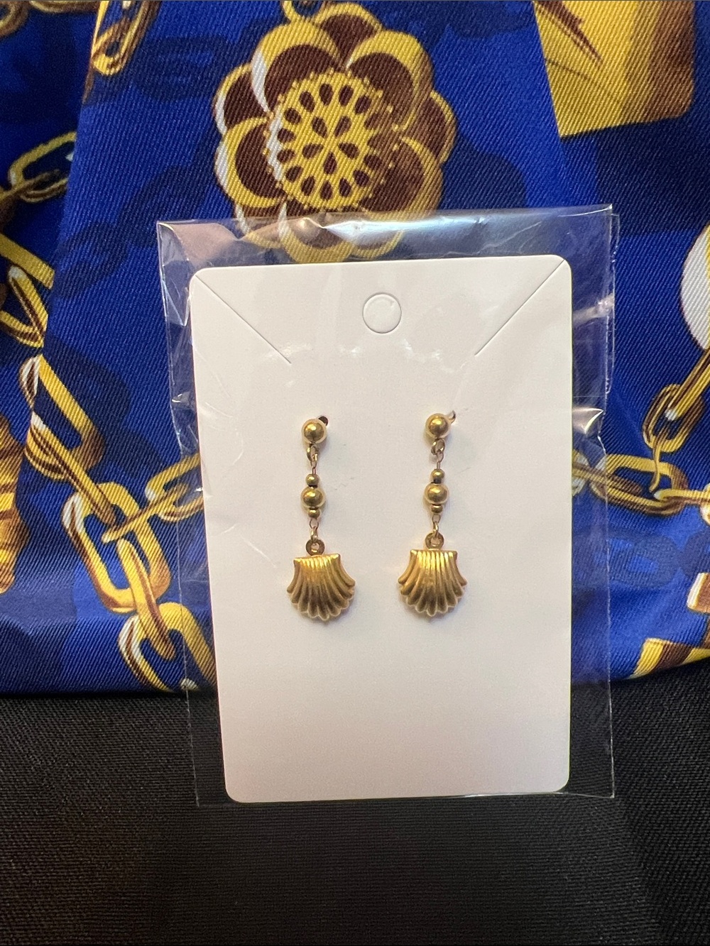 Estée Lauder Pouch and Gold Shell Drop Earrings - Elegant Women's Jewelry